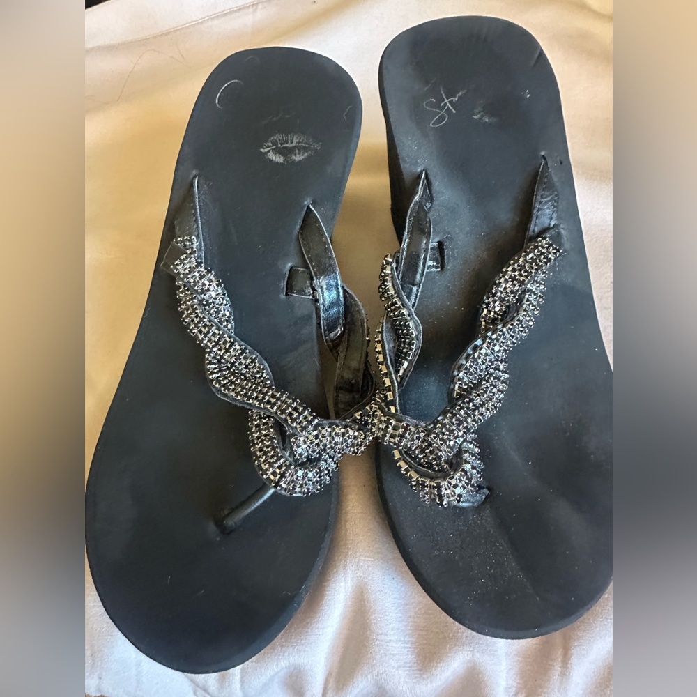 Black Colin Stuart wedge sandal with black rhinestones.
